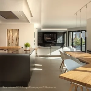 Béton ciré teinte BC-35 Inox par Decostyles pour C13 Architecture - Sol en béton ciré gris dans une cuisine-séjour moderne, signé Rouvière Collection